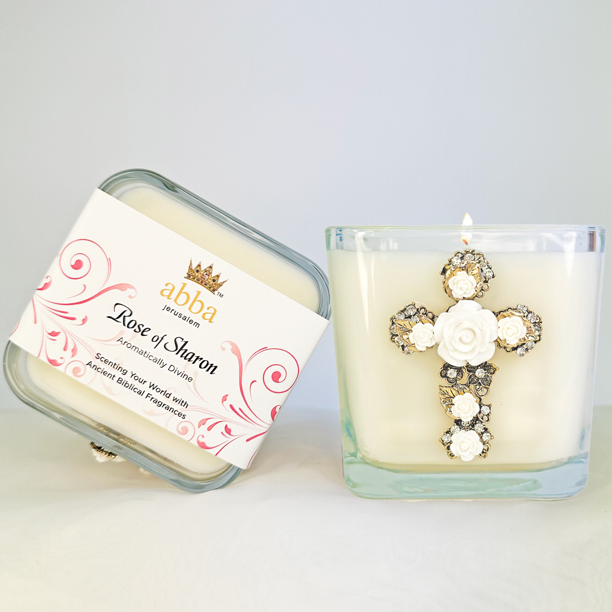 ROSE JEWELED CROSS CANDLE W/ WHITE ROSES